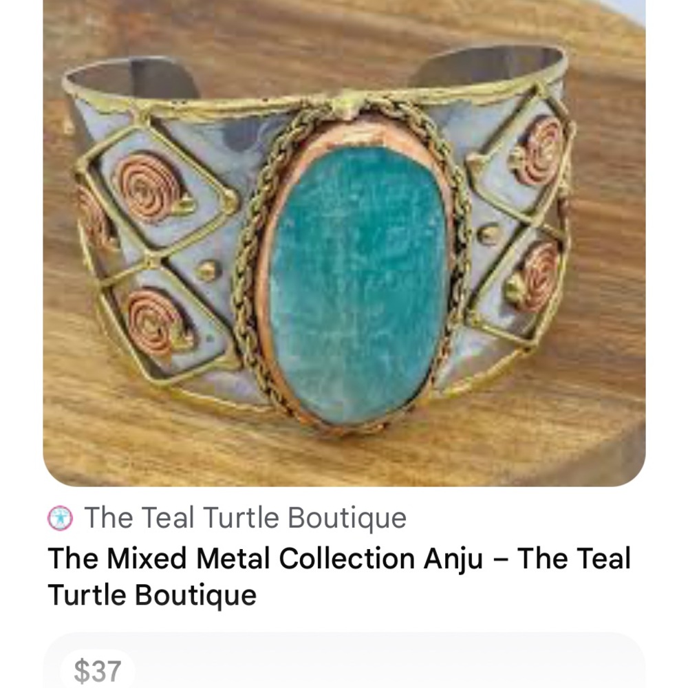 handcrafted cuff bracelet featuring a distinctive green copper patina finish